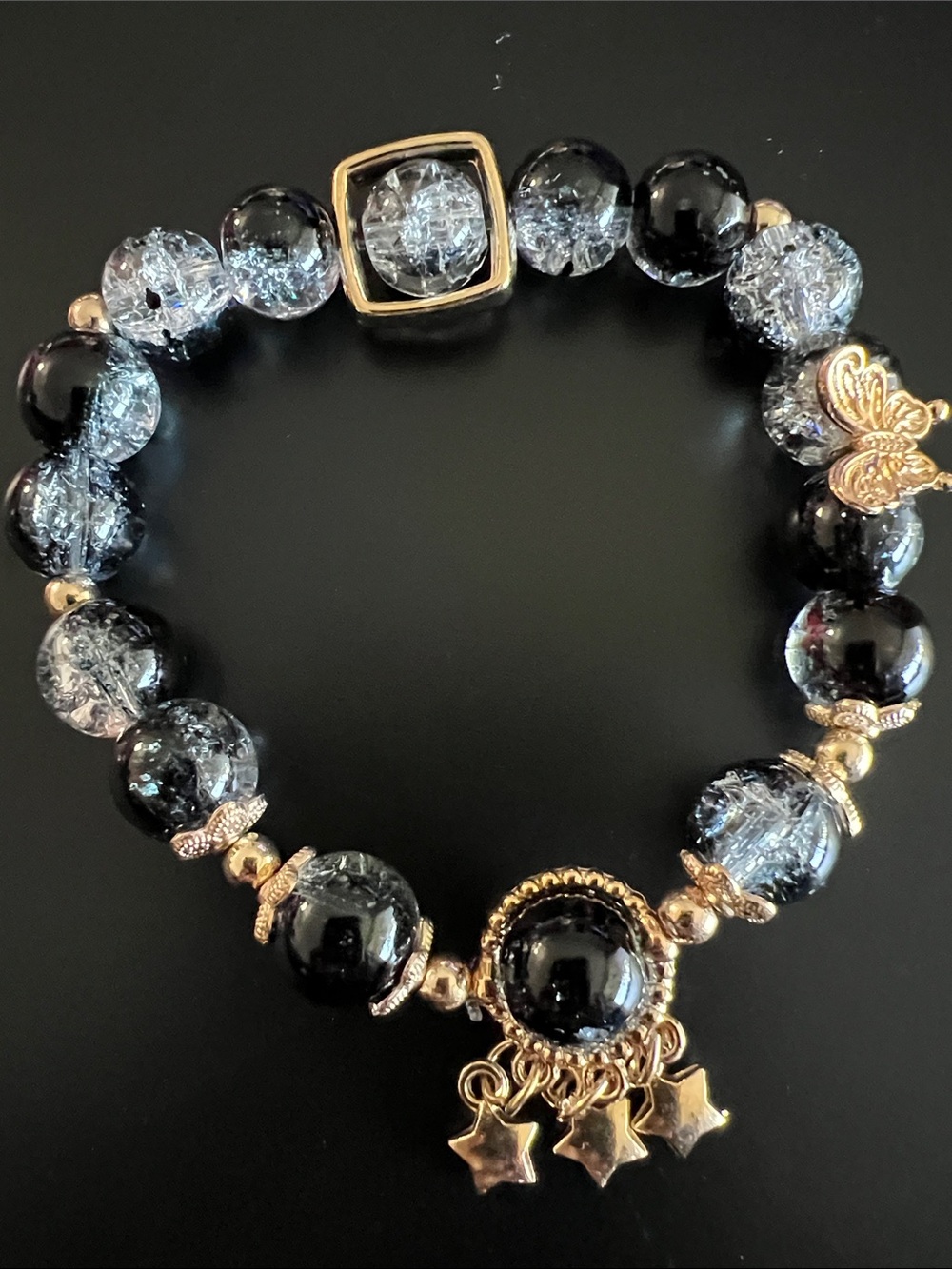 Black and clear Crystal Bead and gold halo and butterfly Bracelet